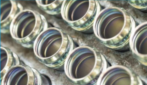 Alkaline zinc trivalent iridescent passivation